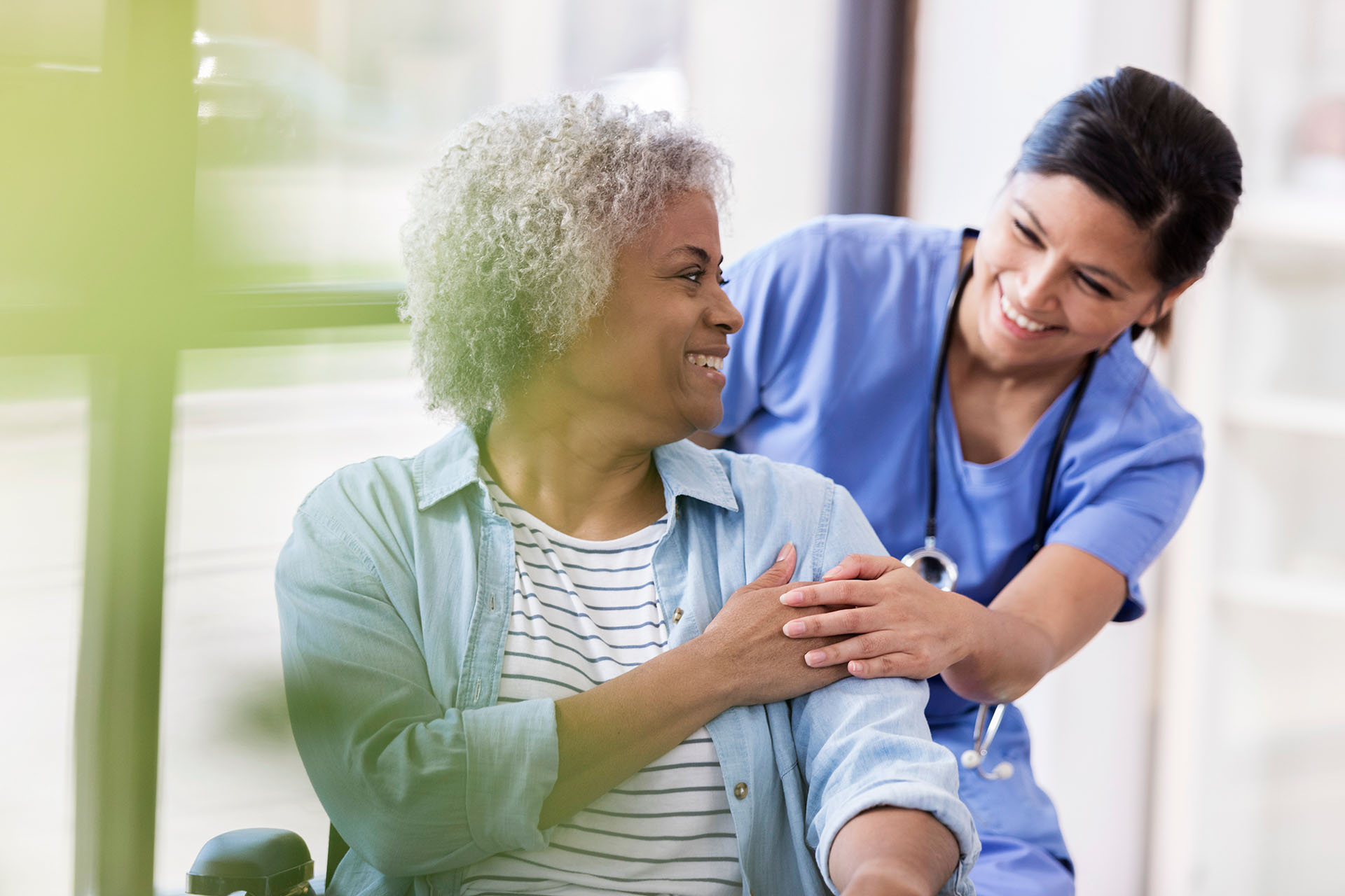 Caregiver and client sharing a conversation